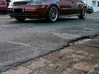 Second-hand Opel Astra 101 CP (74 kW) 2000 Roșu Hatchback