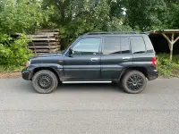 Gebraucht Mitsubishi Pajero Motion 129 PS (94 kW) 2004 Schwarz SUV