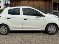 Gebraucht Mitsubishi Space Star 75 PS (55 kW) 2015 Weiß Kleinwagen