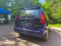 Begagnad Mitsubishi Space Star Motion 98 HK (72 kW) 2004 Blå Minibuss