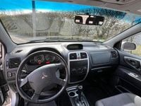 Gebraucht Mitsubishi Space Star 98 PS (72 kW) 2004 Silber Van / Kleinbus