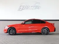 Gebraucht BMW 330 Performance 258 PS (189 kW) 2023 Melbourne rot metallic (a75) Limousine