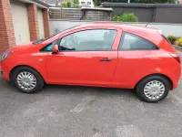 Gebraucht Opel Corsa 60 PS (44 kW) 2009 Rot Kleinwagen