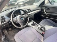 Gebraucht BMW 118 122 PS (89 kW) 2010 Schwarz Kleinwagen