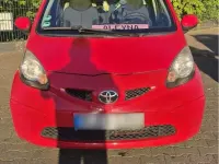 Gebraucht Toyota Aygo 68 PS (50 kW) 2010 Rot Kleinwagen