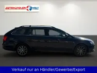 Używany Skoda Superb 105 KM (77 kW) 2014 Niebieski Kombi