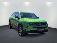 Gebraucht Opel Mokka-e Elegance 100 kW (136 PS) 2022 Matcha green (metallic) SUV