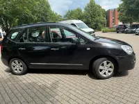 Gebraucht Kia Carens 140 PS (102 kW) 2007 Schwarz Van / Kleinbus