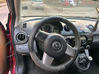 Gebraucht Mazda 2 75 PS (55 kW) 2012 Rot Kleinwagen