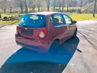 Gebraucht Chevrolet Aveo 84 PS (61 kW) 2009 Rot Kleinwagen