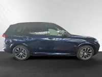 Gebraucht BMW X5 M Sport 381 PS (280 kW) 2024 Bmw individual tansanitblau metallic SUV