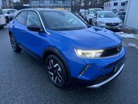 Gebraucht Opel Mokka-e Elegance 100 kW (136 PS) 2023 Lackierung voltaic blue met/ty SUV