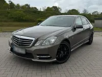 Używany Mercedes E500 408 KM (300 kW) 2011 Brązowy Sedan/Limuzyna