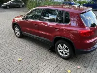 Używany VW Tiguan 122 KM (89 kW) 2012 Czerwony SUV
