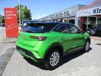 Gebraucht Opel Mokka 101 PS (74 kW) 2022 Matcha green SUV