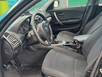 Używany BMW 116 115 KM (84 kW) 2011 Czarny Hatchback