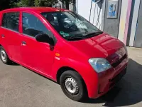 Gebraucht Daihatsu Cuore 58 PS (42 kW) 2003 Rot Kleinwagen