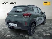 Gebraucht Dacia Spring Comfort 47 kW (65 PS) 2023 Olivgrün Kleinwagen