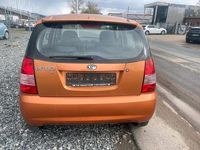 Second-hand Kia Picanto 55 CP (40 kW) 2006 Portocaliu Hatchback