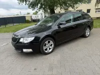 Gebraucht Skoda Superb Ambition 140 PS (102 kW) 2011 Schwarzmagic perleffekt Kombi
