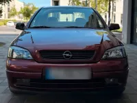 Brugt Opel Astra 116 HK (85 kW) 1999 Rød Sedan
