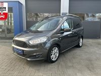 Gebraucht Ford Tourneo Courier 101 PS (74 kW) 2015 Grau (magneticgrau) Van / Kleinbus