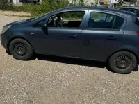 Usado Opel Corsa 90 HP (66 kW) 2008 Cinzento Citadino