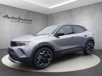 Gebraucht Opel Mokka-e Ultimate 100 kW (136 PS) 2022 Quarz silber (metallic) SUV