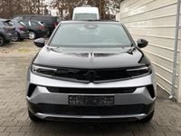 Neu Opel Mokka 145 PS (106 kW) 2025 Tropikal grün metallic / schwarzes dach SUV