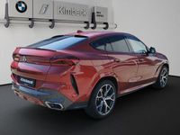 Gebraucht BMW X6 M50 Shadowline 400 PS (294 kW) 2020 Flamencorot brillanteffekt met SUV