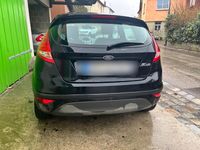 Gebraucht Ford Fiesta Ambiente 82 PS (60 kW) 2010 Schwarz Kleinwagen