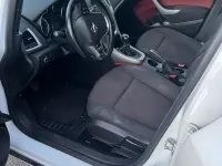 Używany Opel Astra Design Edition 101 KM (74 kW) 2011 Biały Kombi