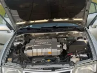 Gebraucht Mitsubishi Carisma 125 PS (91 kW) 1998 Silber Limousine