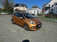 Gebraucht Hyundai i10 67 PS (49 kW) 2015 Orange Kleinwagen