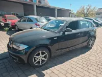 Second-hand BMW 116 122 CP (89 kW) 2008 Negru Hatchback
