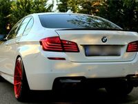 gebraucht BMW M5 mit Akrapovic und individual Lack und Leder