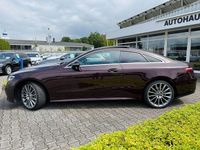 Gebraucht Mercedes E300 AMG 265 PS (194 kW) 2023 Rubellitrot  metalliclack Coupé