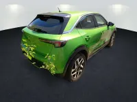 Gebraucht Opel Mokka Elegance 131 PS (96 kW) 2024 Lackierung matcha green/typ aussenverkle (metallic) SUV