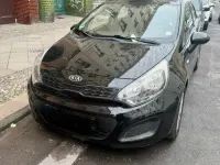 Gebraucht Kia Rio 85 PS (62 kW) 2011 Schwarz Kleinwagen