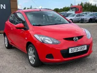 Używany Mazda 2 Inclusive 68 KM (50 kW) 2009 Czerwony Hatchback