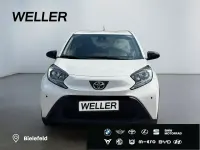 Gebraucht Toyota Aygo X X-play 72 PS (52 kW) 2023 Pure) white ii (weiss SUV