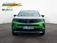 Gebraucht Opel Mokka-e Ultimate 100 kW (136 PS) 2023 Matcha green/ikone gruen SUV