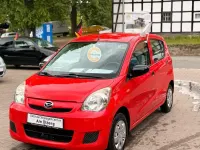 Gebraucht Daihatsu Cuore 69 PS (50 kW) 2010 Rot Kleinwagen