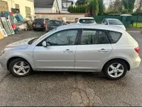 Używany Mazda 3 105 KM (77 kW) 2005 Srebrny Sedan/Limuzyna