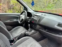Używany Opel Combo 90 KM (66 kW) 2014 Czerwony Minivan