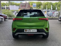 Gebraucht Opel Mokka-e Elegance 100 kW (136 PS) 2022 Matcha green/ikone gruen SUV