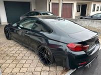 gebraucht BMW M4 Coupé schwarz mit roter Leder Ausstattung