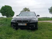 Gebraucht BMW 520 184 PS (135 kW) 2011 Schwarz Kombi