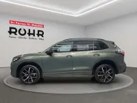 Gebraucht VW Tiguan R-line 265 PS (194 kW) 2025 Cipressinogrün metallic SUV