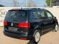 Używany VW Touran Style 105 KM (77 kW) 2011 Czarny Minivan